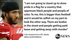 Who Is Sitting With Colin Kaepernick
